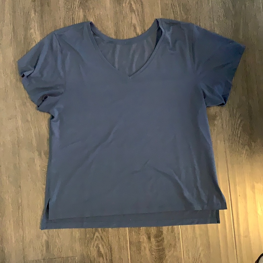 Never worn, tags removed Lululemon t-shirt.